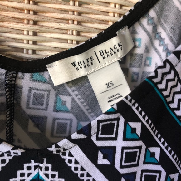 Black house white market. One x- small tank. Like new condition. - Picture 4 of 4